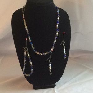 Necklace set has bracelet and earrings